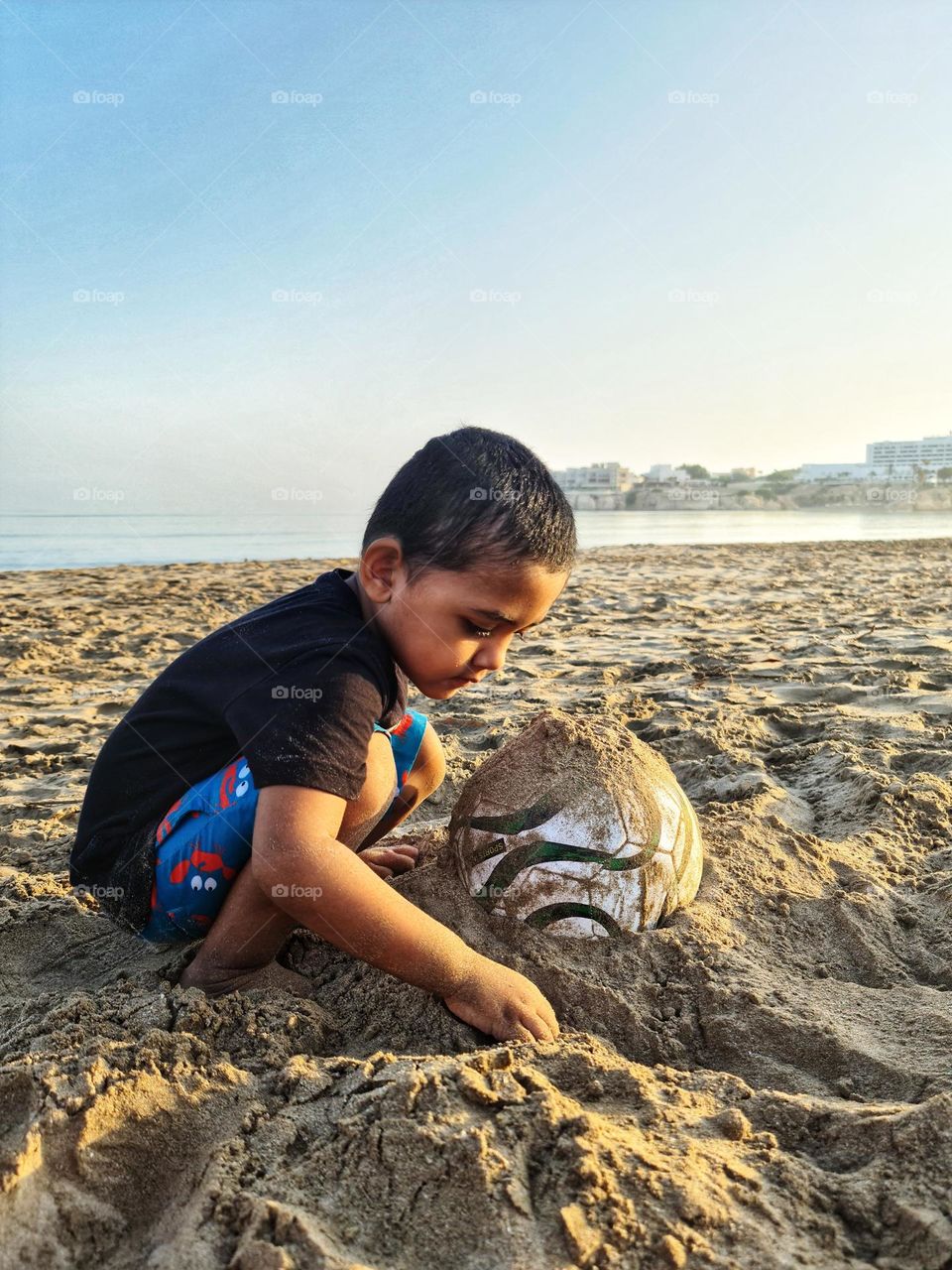 Beach Fun with his Fav Ball.