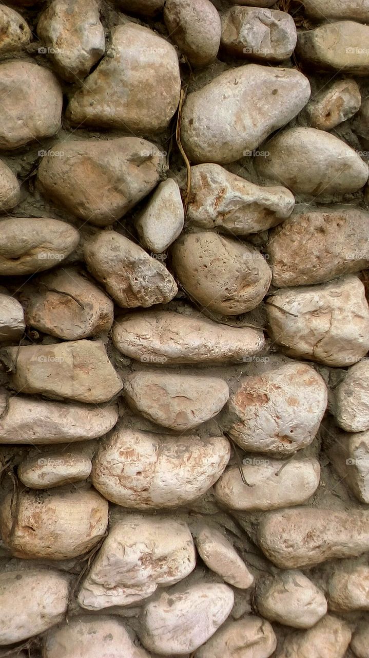 Rough old wall stone with ancient texture