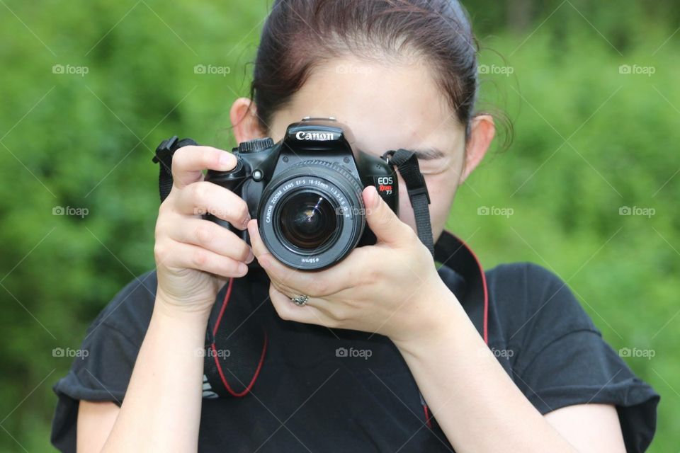 Girl taking photo