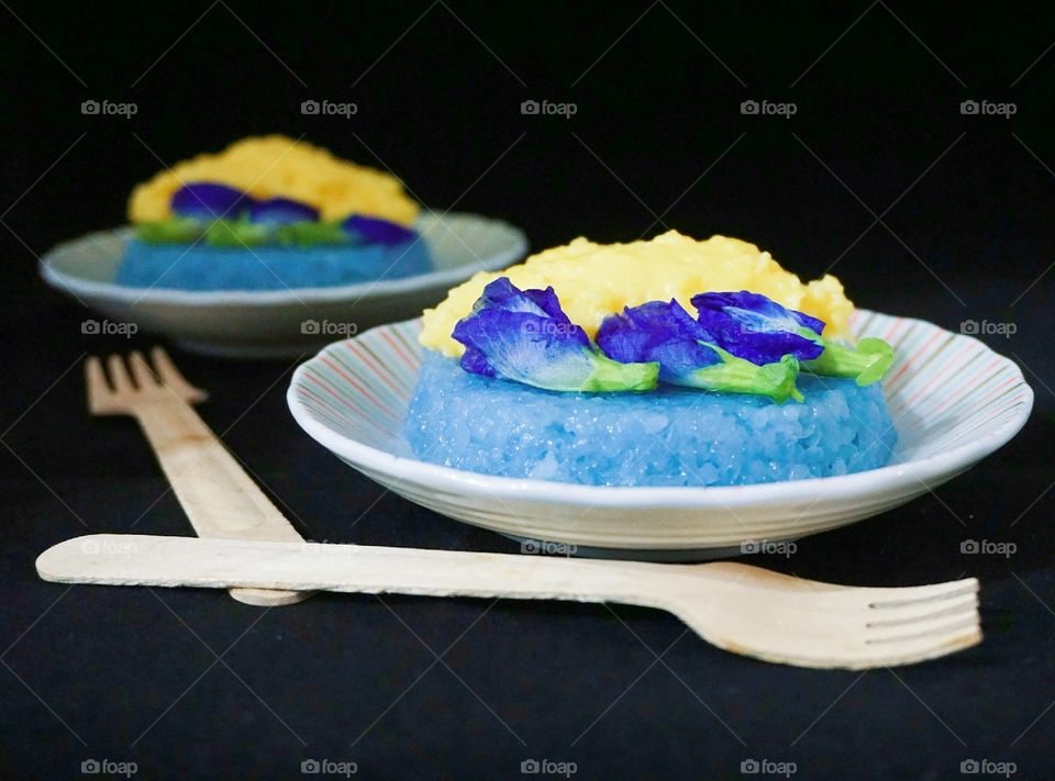 Sweet blue pea sticky rice with coconut custard