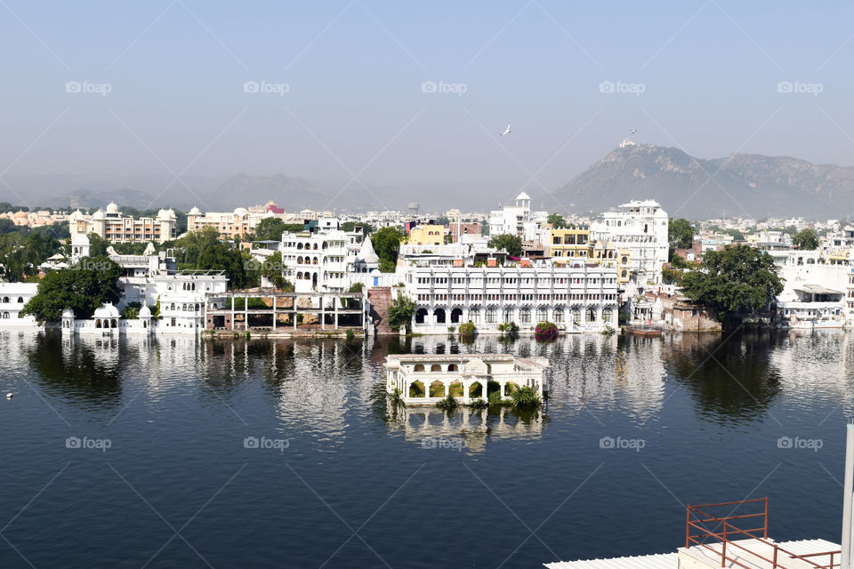 Lake Pichola, Udaipur city, Indian state of Rajasthan, May 2019 – Artificial fresh water lake, named after Picholi village. Two islands, Jag Niwas and Jag Mandir are located within Pichola Lake.