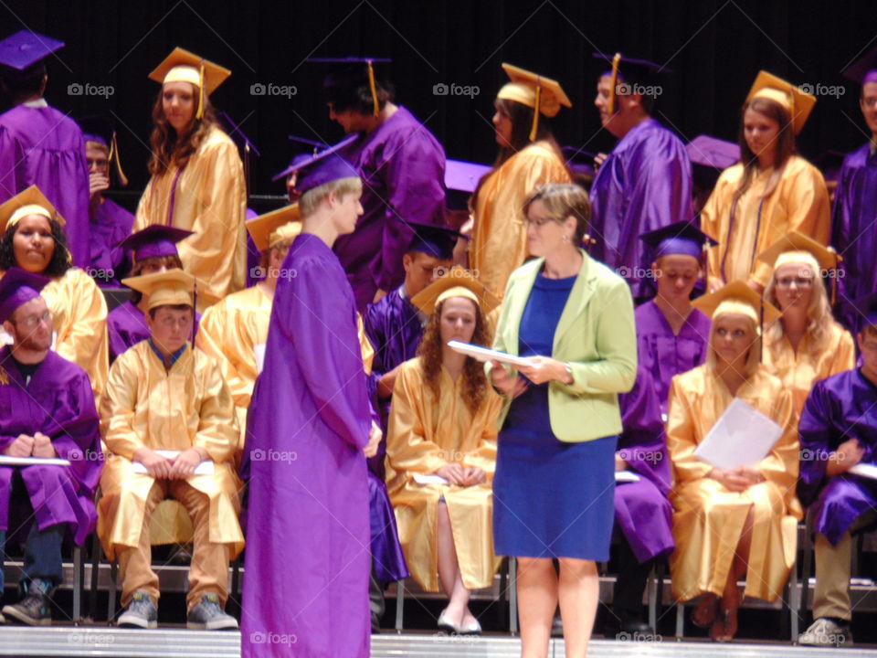 receiving the diploma