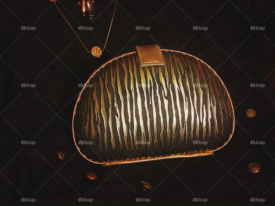 Gold zebra print purse 