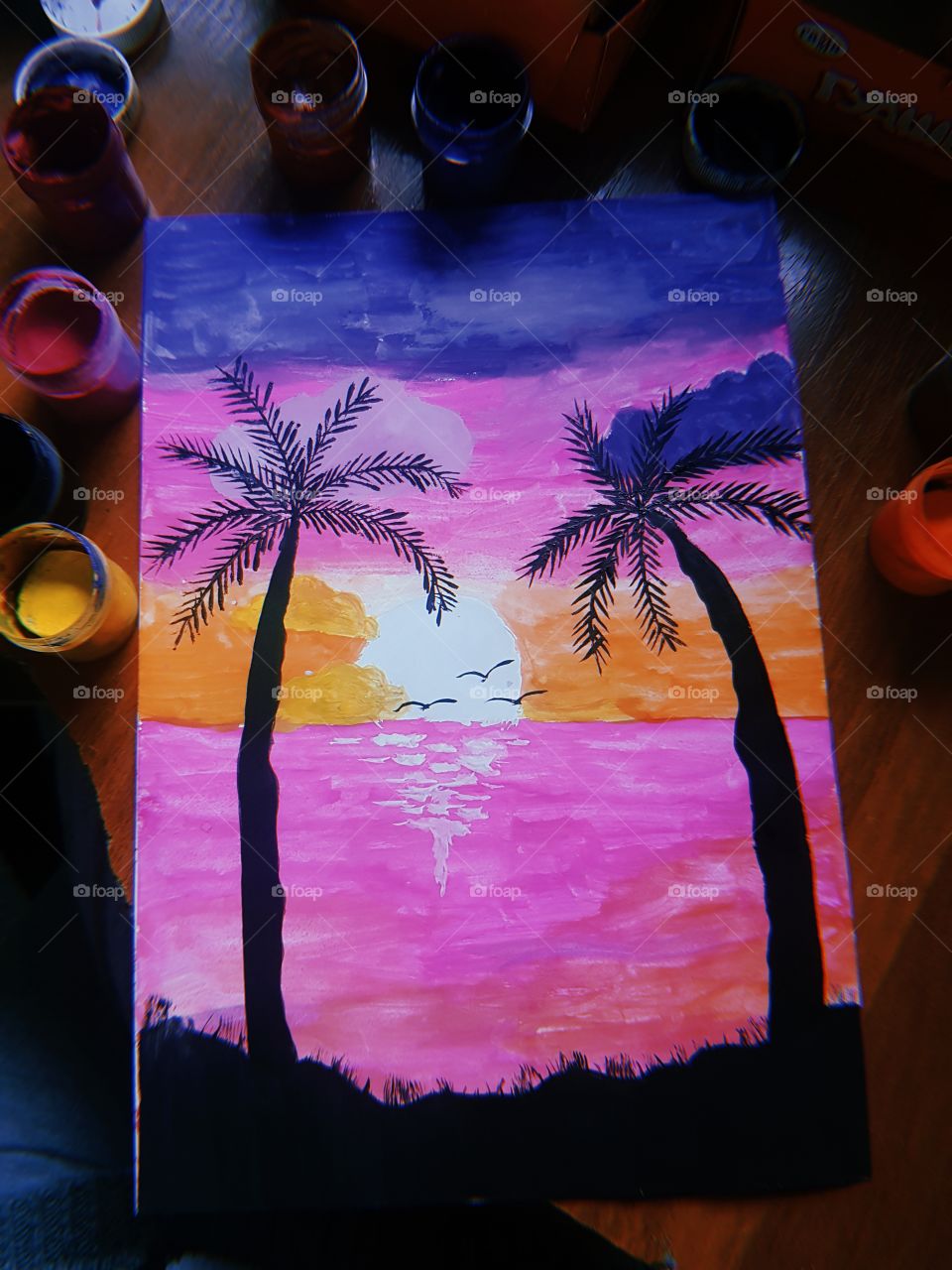 Heavy beach on sunset. The picture is drawn paint. Photo of my art. Different colors.