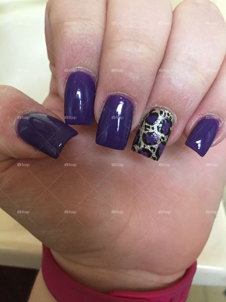 Purple nails with a cheetah pop