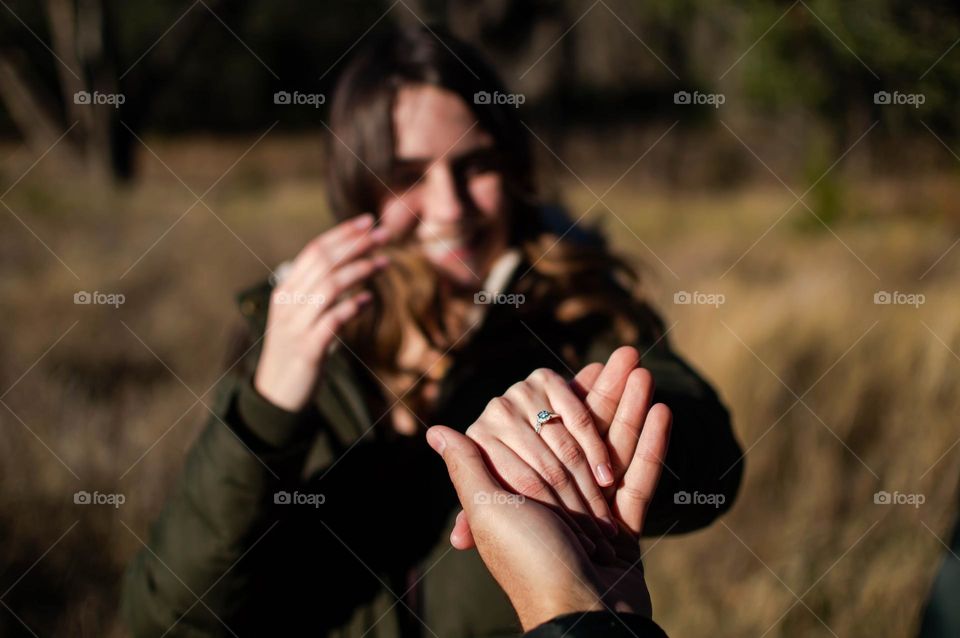 Emotional moment my daughter was engaged. Smiling thru tears, holding hands. 