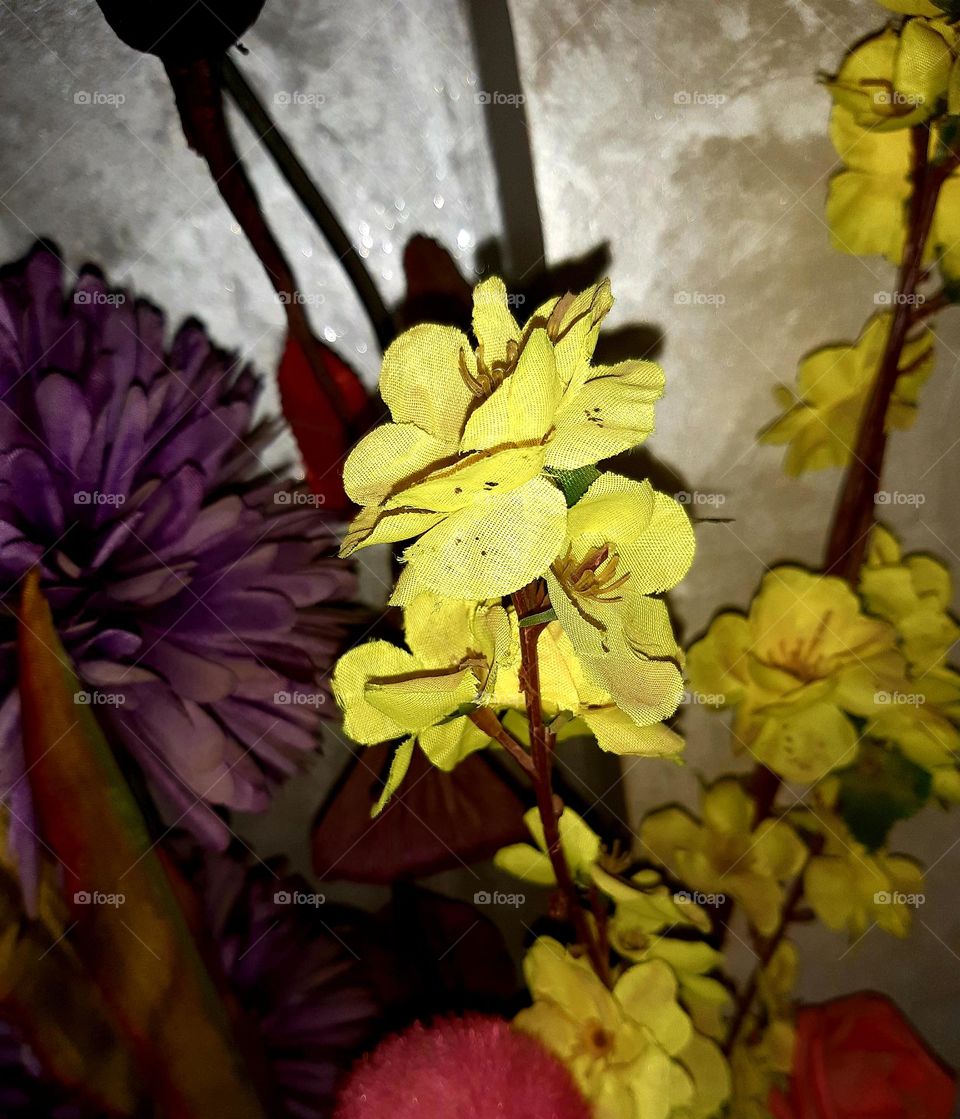 A beautiful arrangement of yellow roses in a vase, radiating warmth and elegance, perfect for home or event decor in Casablanca on January 1, 2025. The soft petals of the roses add a touch of vibrancy, complementing the serene atmosphere