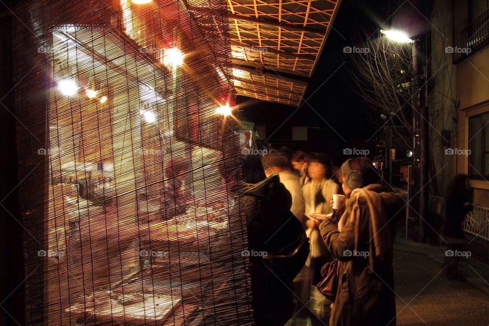 A street stall selling food at night