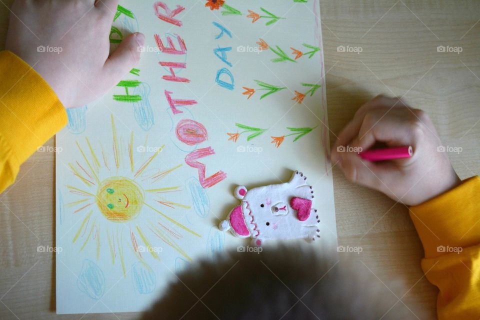 child boy drawing pencils, creative kind