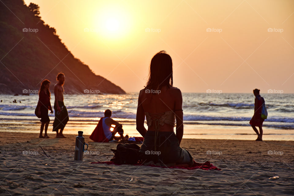 Evening yoga in the beach