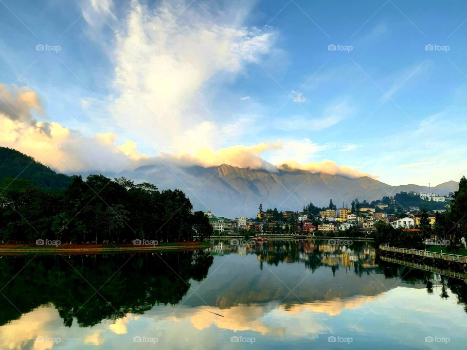 winter morning in Sapa ancient Town in Lao Cai province - Việt Nam with reflection of mountain and blue sky