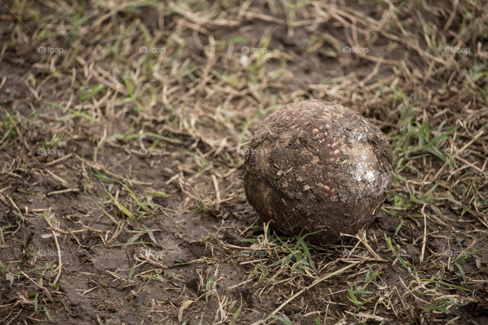 muddy baseball ball