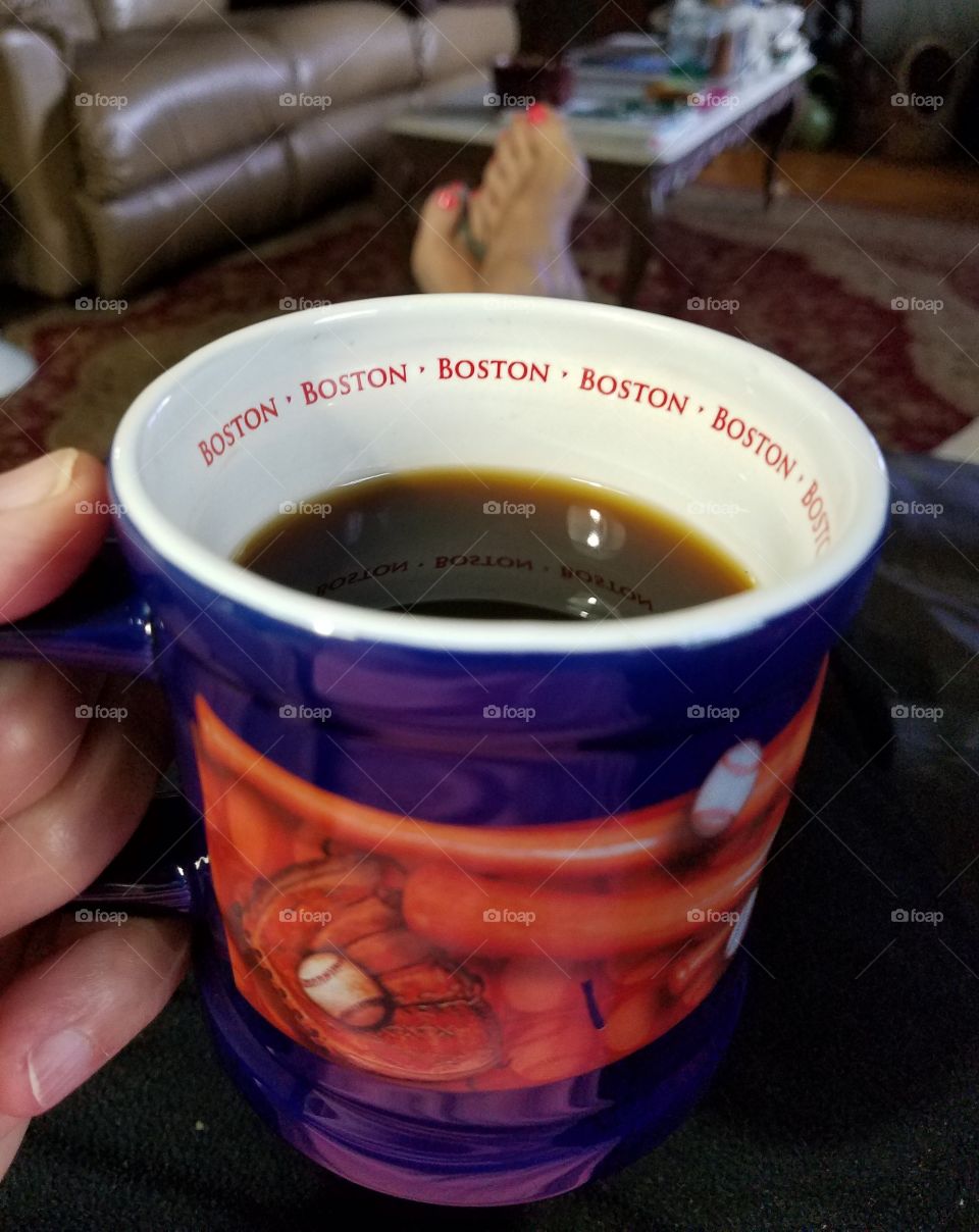Boson Baseball mug with morning hot coffee or tea, feet up.