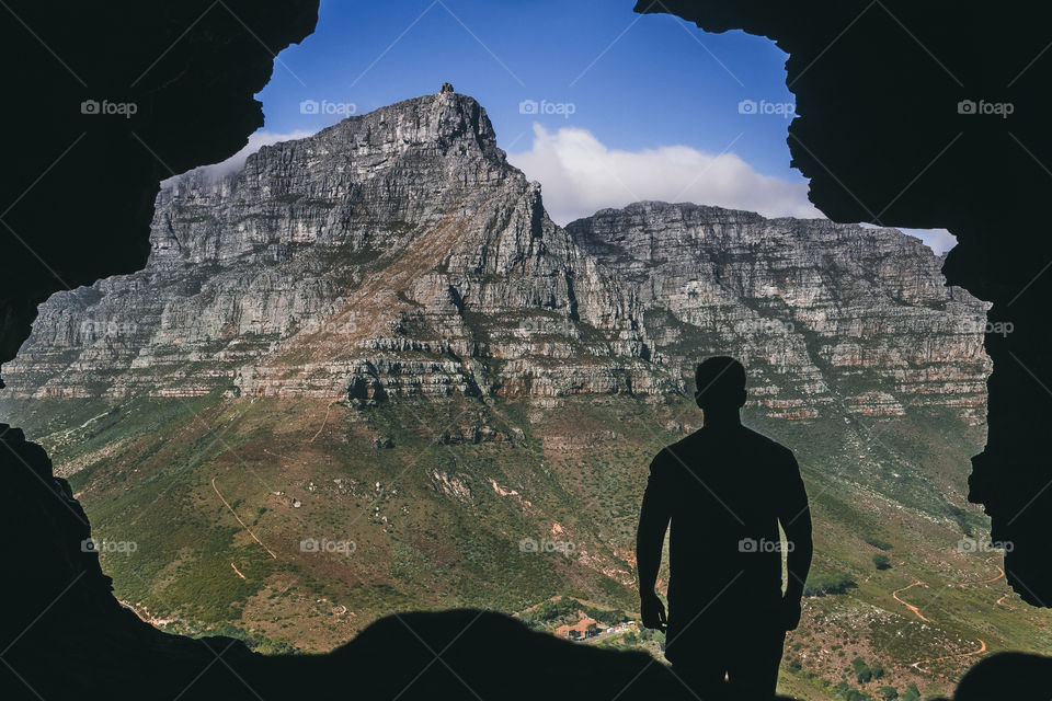 A look through the keyhole of a cave that looks onto Cape Town’s Table Mountain.
