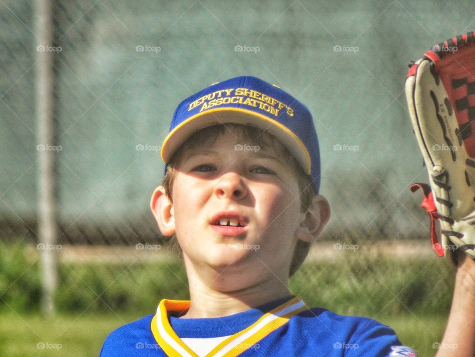 Boy Waiting To Catch A Ball
