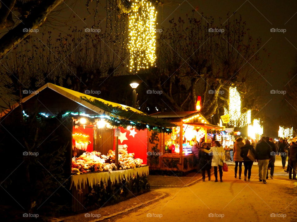 walk over a Christmas market with sales houses