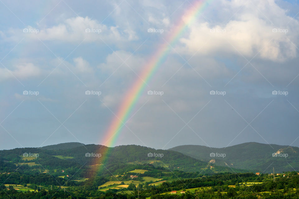 Rainbow over field