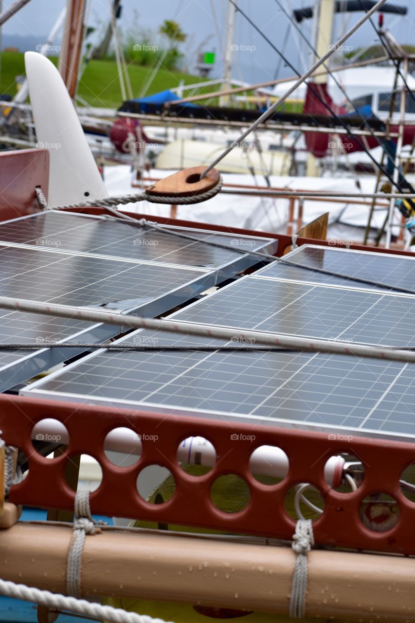 Solar panels on Hokule’a, a voyaging canoe built to revive the centuries-old tradition of Polynesian exploration. sailed by a crew of 12 who use only celestial navigation and observation of nature, the canoe completed a 4-year trip around the world.