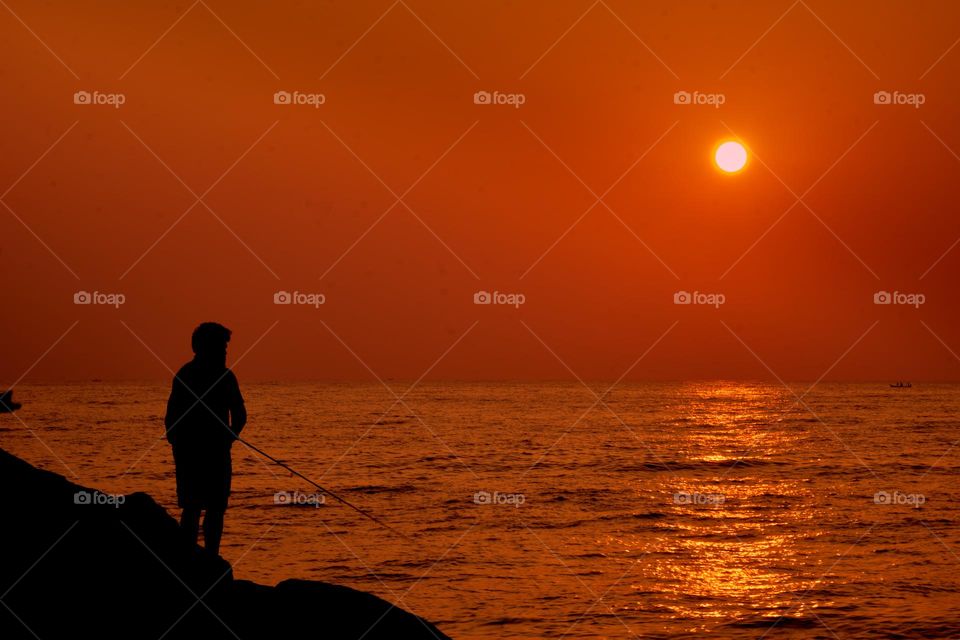 Sun rise - Leisure activity - Fishing in the morning - Silhouette 