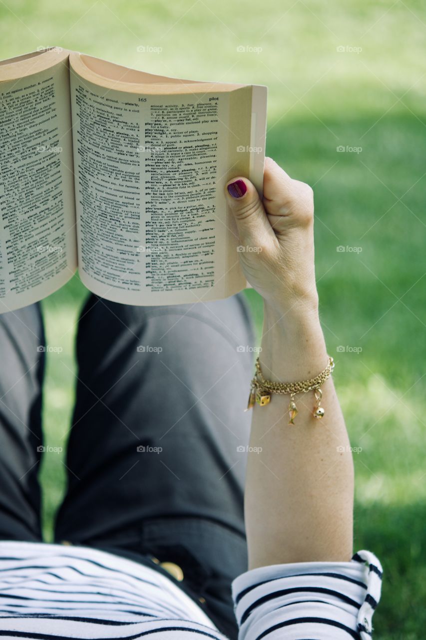 Reading a book outside 