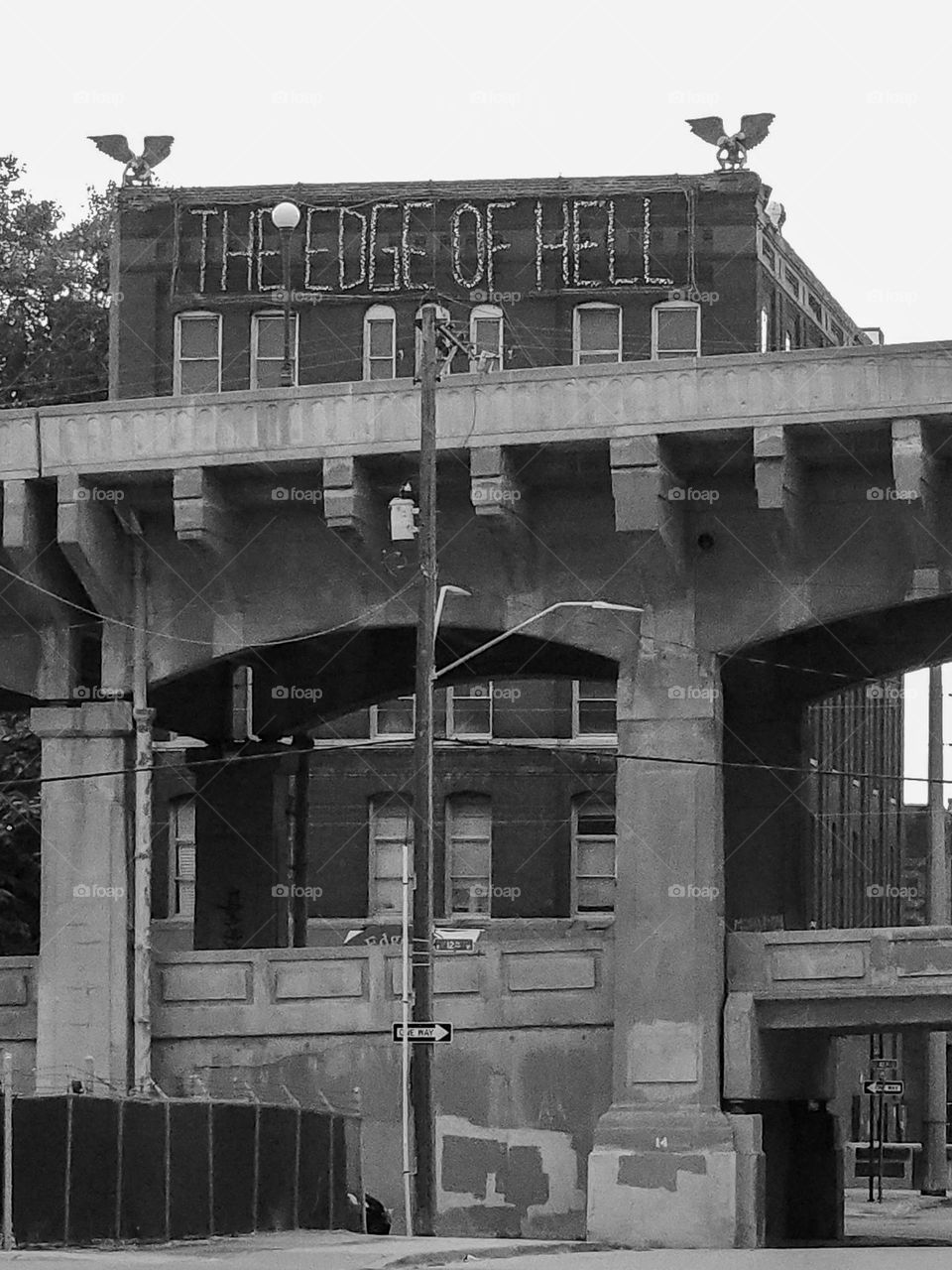 The Edge of Hell is spelled out atop an incredibly scary building not wanting to attract visitors