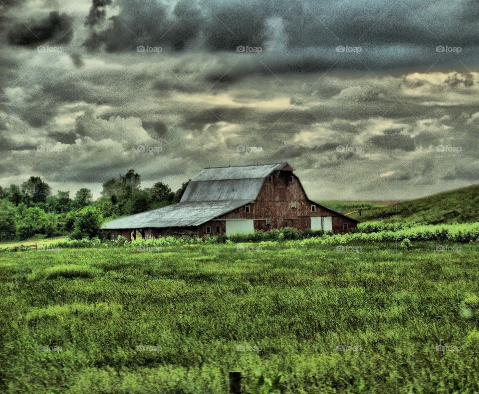 HDR red barn with stormy sky