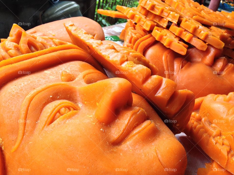 Buddha statue .
Buddha face thailand handmade candlewax
People thailand belive in Buddha.