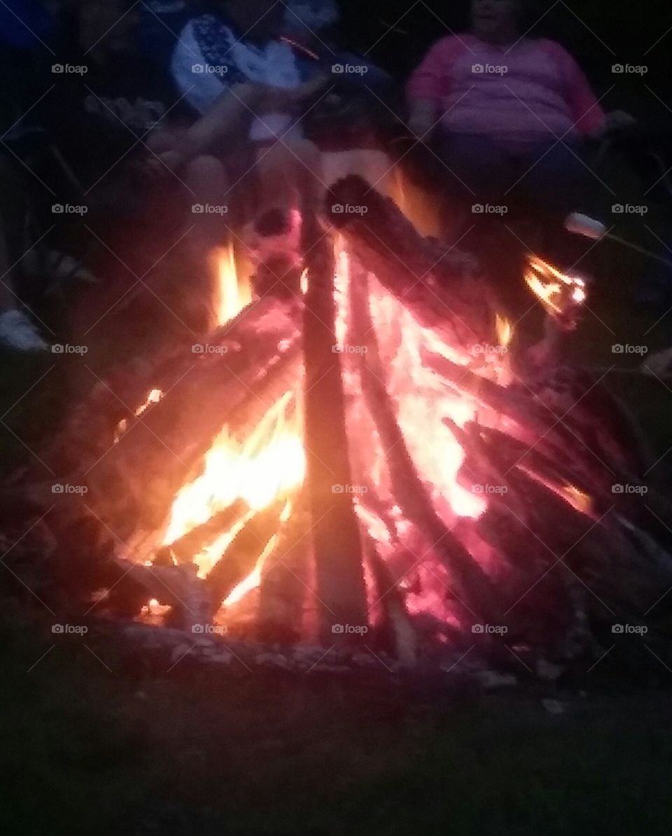 bon fire night. sitting around a bon fire.