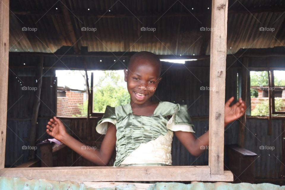 Happy child in window