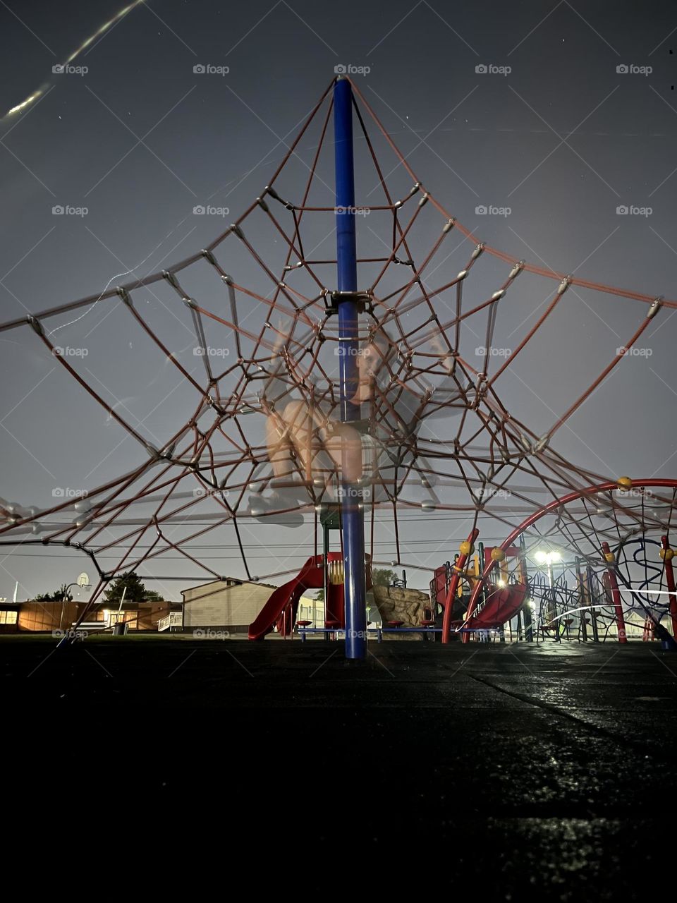 A strange, eerie outcome from playing with latenight long exposures at a playground 