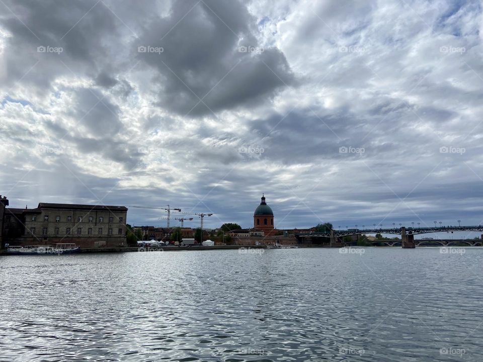 Clouds above the Garonne river in toulouse 