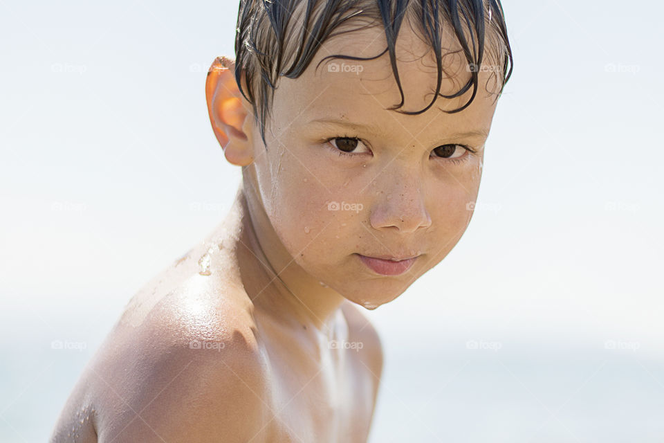 Close-up of a wet boy