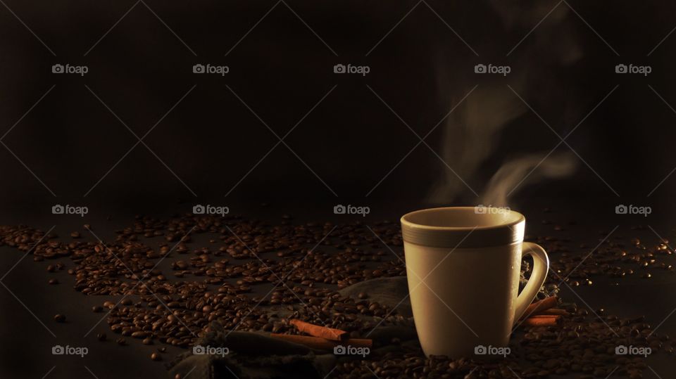 Hot coffee with coffee beans