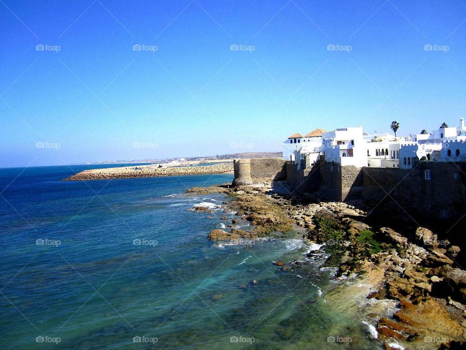 Scenic view of beach and fort