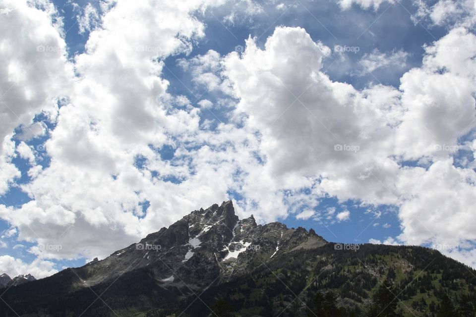 Scenic view of snowy mountains