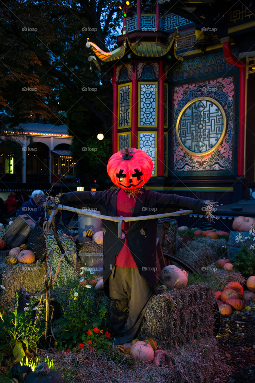 Halloween figure with halloween costume at a market in Theme park Tivoli in Copenhagen Denmark.