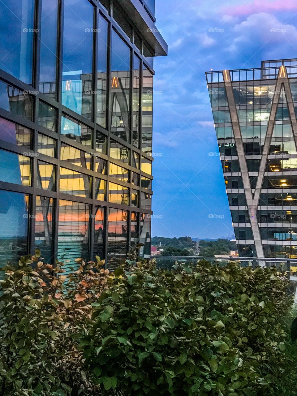 Rainbow reflection on glass building 