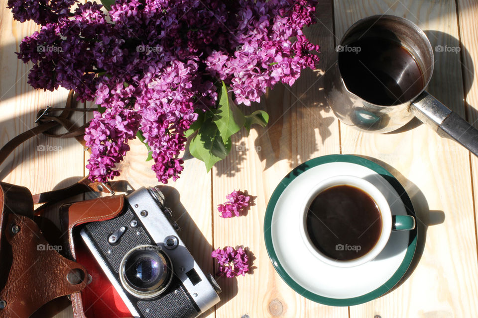 High angle view of coffee cup on table