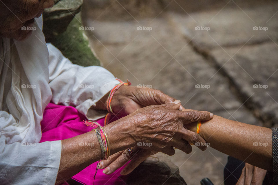 In the inner sanctum of one of the Angkor Wat temples I came across this magical old lady who gave me her blessings and rid me of bad energy