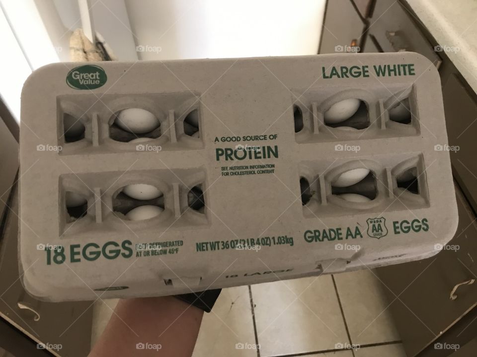 A case of fresh eggs from the market. A healthy source of protein, they are on their way to the refrigerator where they will be safeguarded against detrimental temperatures.