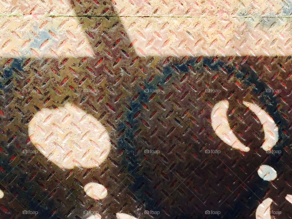 Shadows on diamond tread steel 
