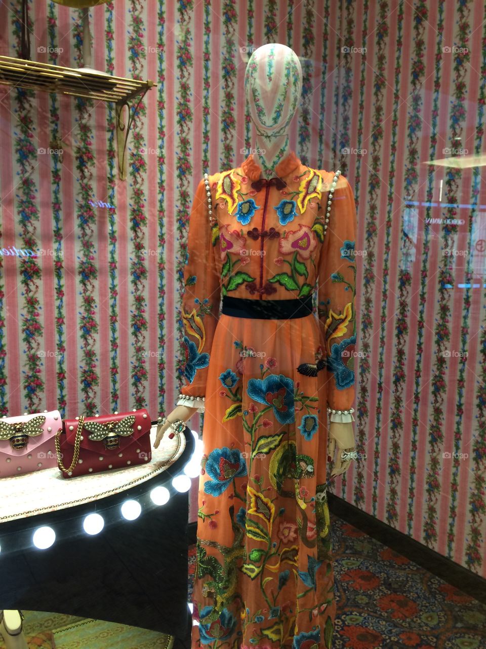 Gorgeous dress and handbags window display at Gucci shop in Mall of the Emirates.