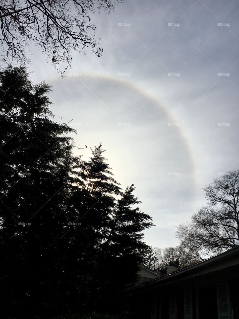 Sunbow aura brings a lovely touch to a beautiful fall sky; rarely seen in the city. 