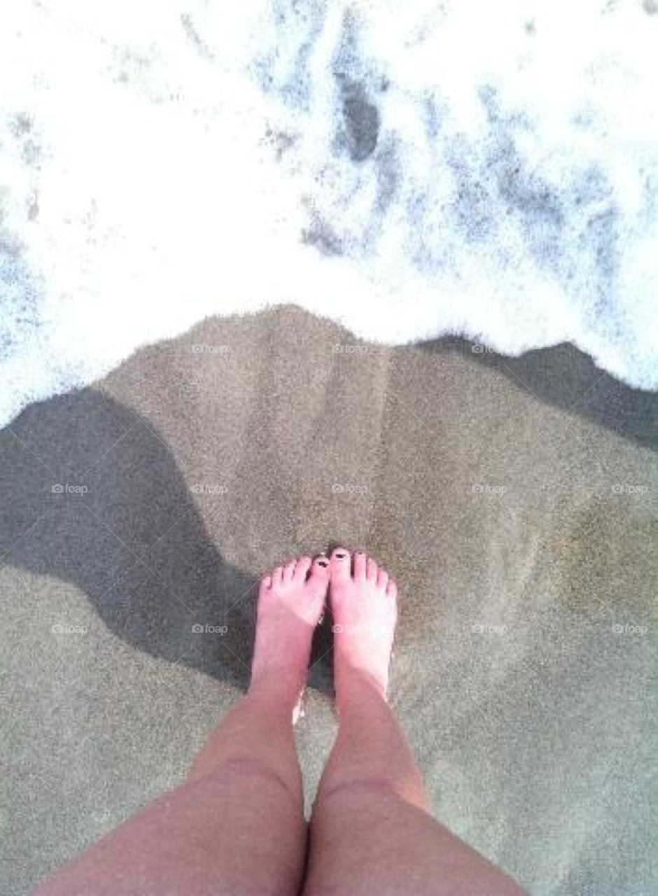 Toes on sand. I took this photo while on vacation with my family at the lake