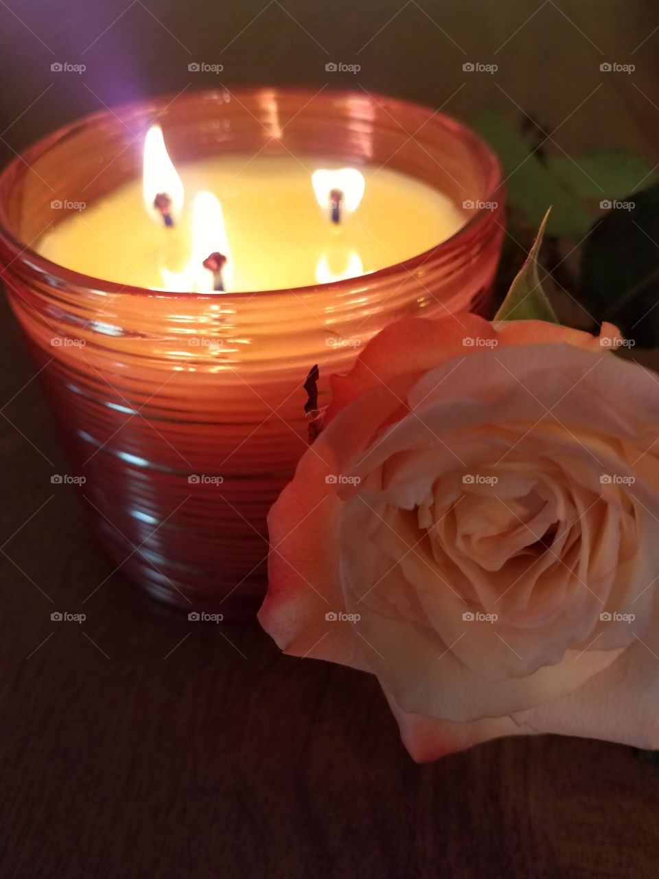 candle and a rose