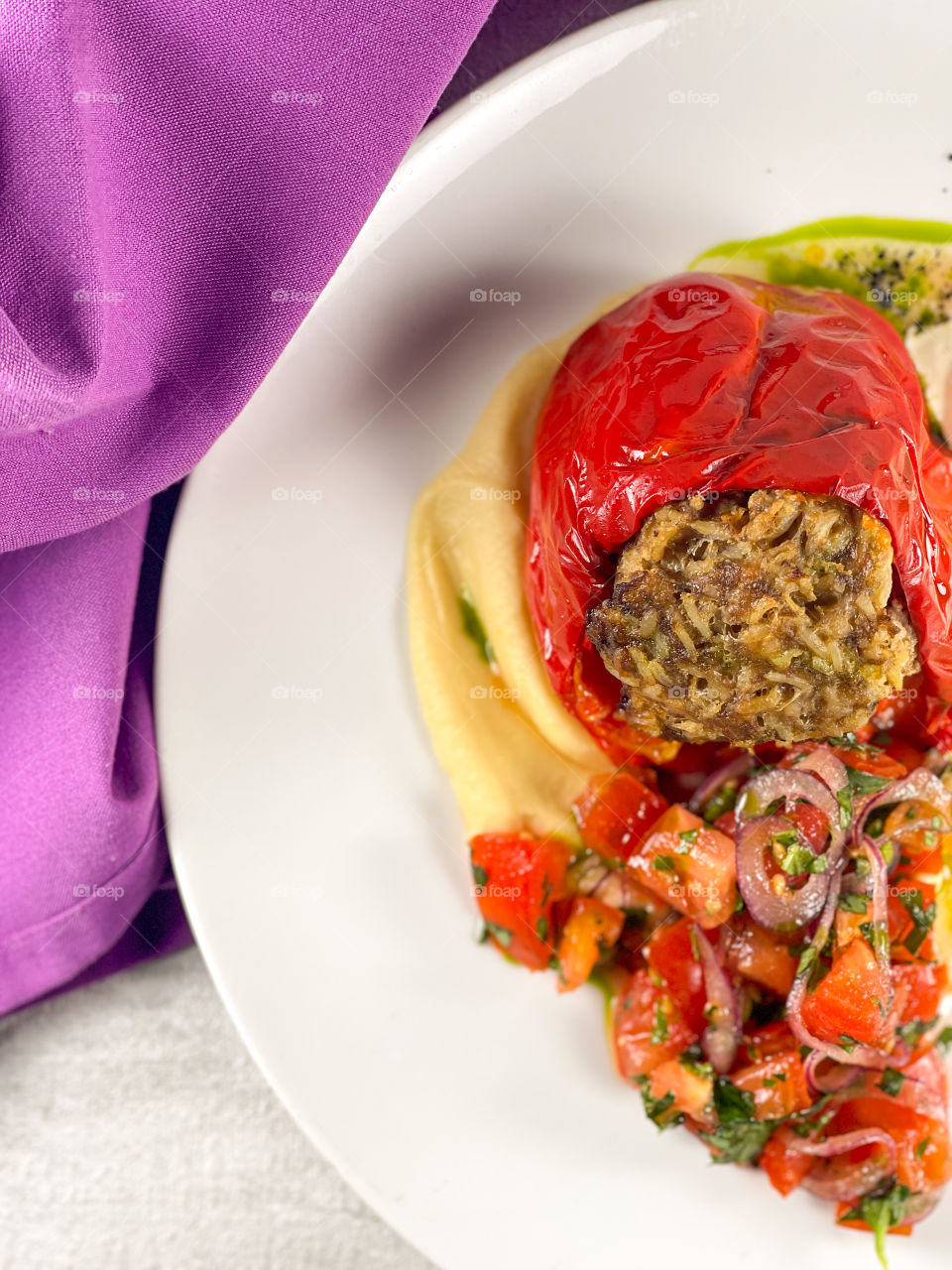 Stuffed bell pepper with tomatoes