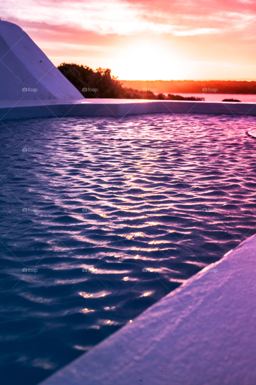 Sunset and water ripples on a pool. Party anyone?