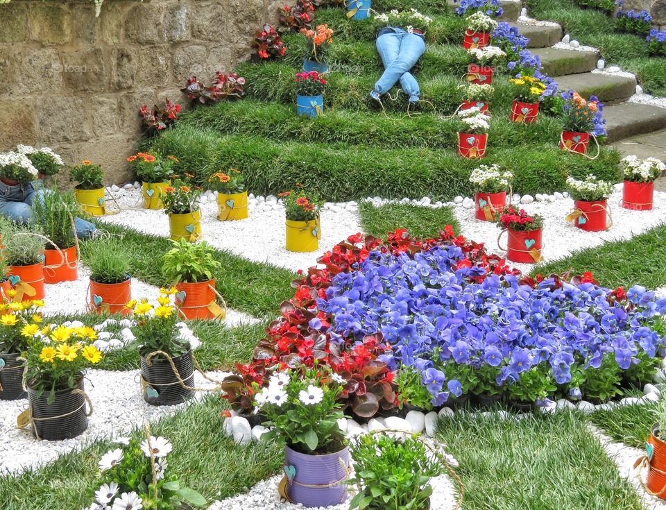 colorful flowers composition over a garden steps - Viterbo, Italy