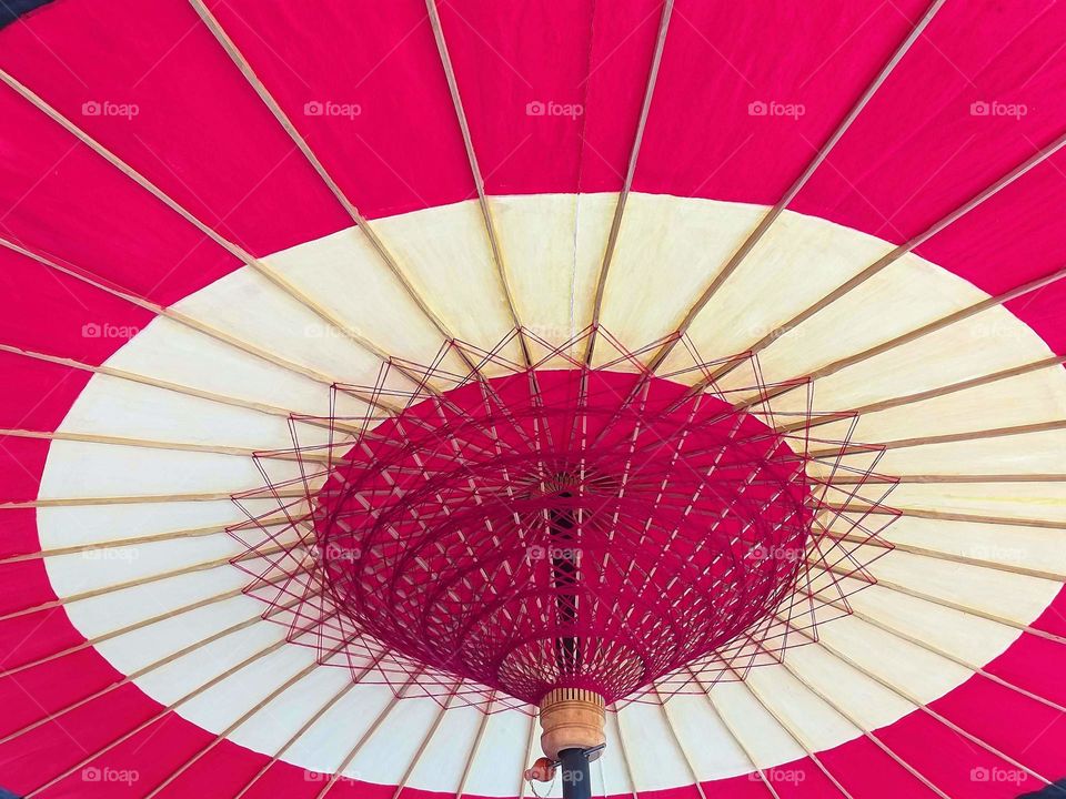 red bamboo umbrella. Chiness New Year