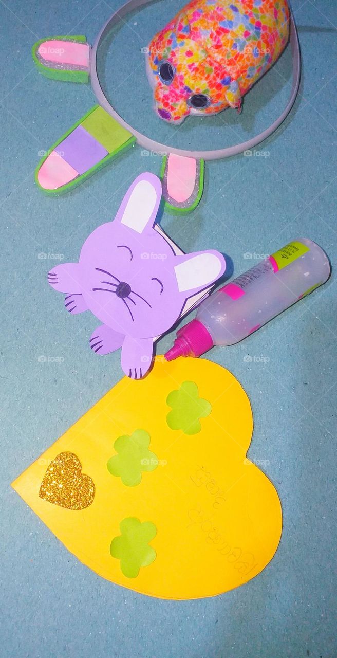 Crafts for children- cat, hair band, invitation  card, and mouse with a bottle of gum